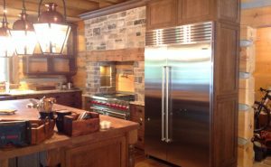 How Custom Millwork Can Soften the Look of Commercial-Grade Kitchen Appliances